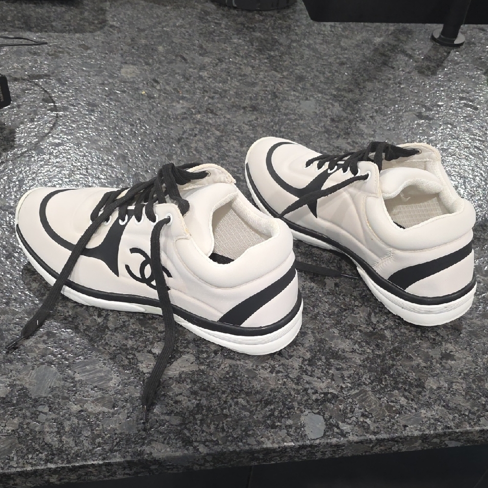 White and Black Athletic Sneakers with Signature Logo